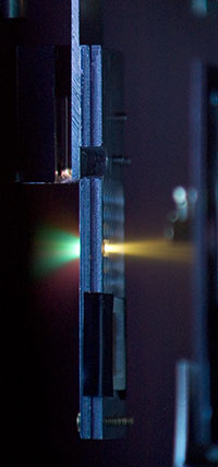Laser shot on copper target. Photo.